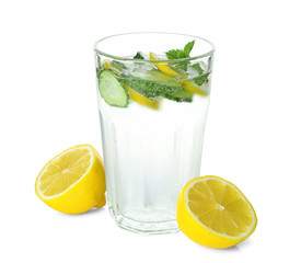 Glass of fresh cucumber water with lemon and mint, isolated on white