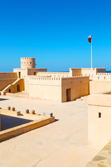 in oman    muscat    the   old defensive  fort battlesment sky and  star brick