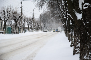 Cars on a road after snowfall