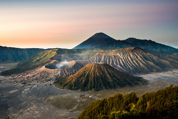 Fototapeta na wymiar Mount Bromo volcano (Gunung Bromo) during sunrise from viewpoint on Mount Penanjakan, in East Java, Indonesia.