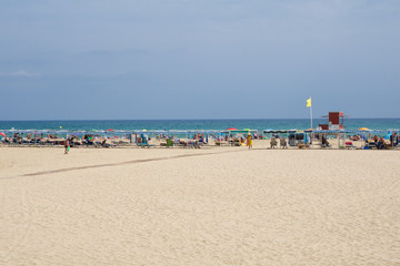 CAMBRILS, SPAIN - AUG 27th, 2017: Sandy beach on the Costa Daurada in the province of Tarragona, Catalonia