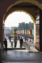 Unidentified tourista at the entrance gate to the Temple of Heaven Park in Beijing, China