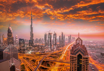 Fototapeta na wymiar Dubai against colorful sunset with modern futuristic architecture , United Arab Emirates