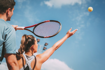 Girl Practice Tennis With Coach - obrazy, fototapety, plakaty