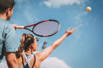 Zelfklevend Fotobehang Girl Practice Tennis With Coach © milanmarkovic78