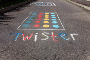 children's game twister on the asphalt