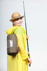 Woman with fishing rod, spinning equipment