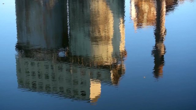 Industrial soda ash site at Brunner Mond, Winnington, Northwich, Cheshire in the process of being demolished, reflected in river water.