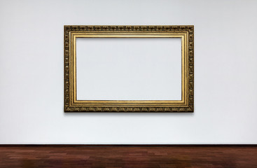 Empty frame on white wall in Museum. place for pictures