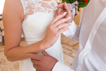 Wedding ceremony, bride, groom, Officiant, outdoors, exchanging rings