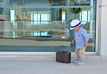 Young traveler with a suitcase