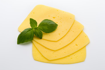 Cheese slices on the white background.