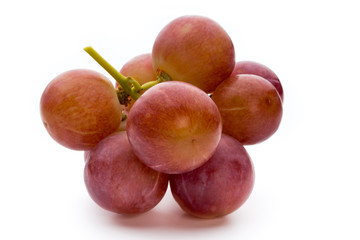 Ripe red grape isolated on white.