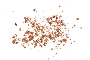 grated chocolate isolated on white background. Top view