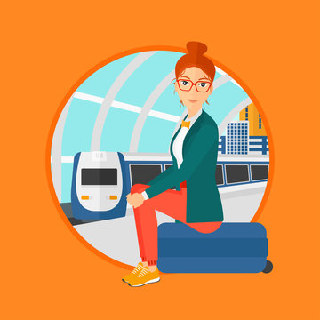 Woman sitting on a suitcase at the train station on the background of arriving train. Woman waiting for a train at the platform. Vector flat design illustration in the circle isolated on background.