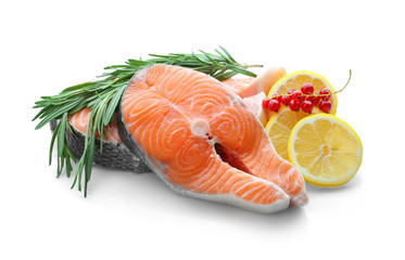 Fresh salmon steaks on white background