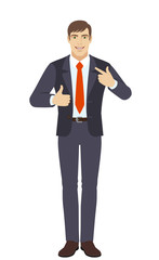 Businessman showing thumb up and  pointing the finger at himself