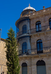 old Facade with glazed balconies