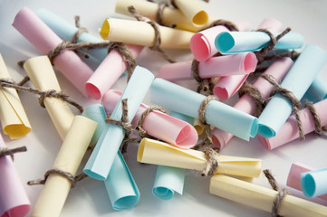 Glass jar with colored notes with blur and toning