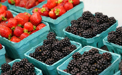 Fresh strawberry and blackberry in the container box