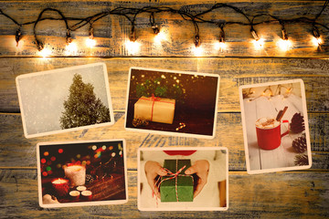 Photo album in remembrance and nostalgia in Christmas (winter season) on wood table. photo of retro...