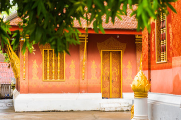 Fototapeta premium View of the courtyard of the Wat Sensoukaram temple in Louangphabang, Laos. Close-up.