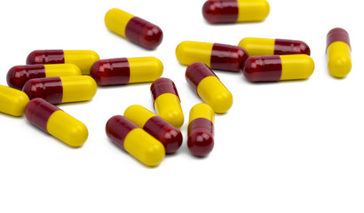 Colorful of antibiotic capsules pills isolated on white background with clipping path, drug resistance concept