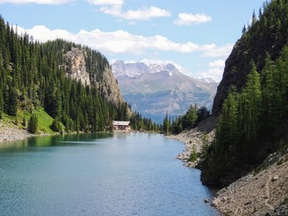 Fototapeta premium Tea House and Views hiking around Lake Agnes, close to Lakeview trail, Plain of six glaciers, Lake Agnes, Mirror Lake, Little and Big Beehive, Banff National Park, Canada, Alberta