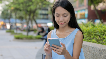 Woman looking at mobile phone