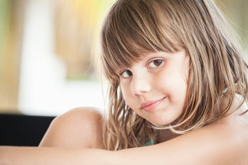 Serious Blond Caucasian little girl, close-up