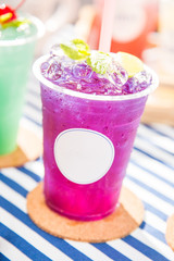 iced minted butterfly pea flower with hint of lime juice, soda drink
