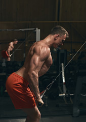 Fototapeta na wymiar Muscular man stretching