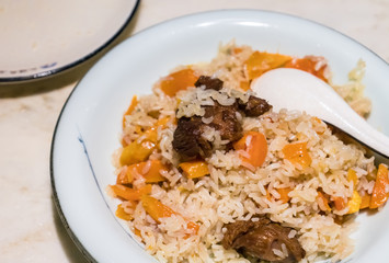 traditional food hand pilaf in xinjiang,china