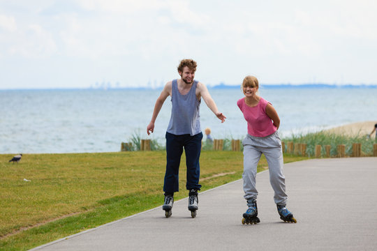 Teens together on skating date.