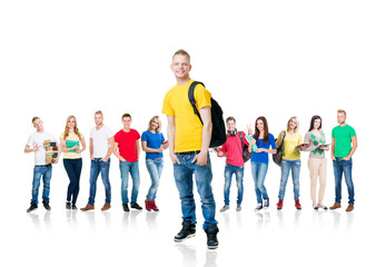 Large group of teenage students isolated on white background. Many different people standing together. School, education, college, university concept.