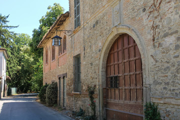 Fototapeta na wymiar Old buildings in ancient Grazzano Visconti, Italy