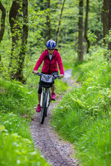 Fototapeta premium Woman riding bike 