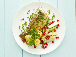 Baked carpenter with herbs