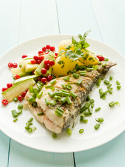 Baked carpenter with herbs