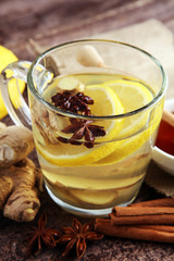 Cup of Ginger tea with lemon and honey.