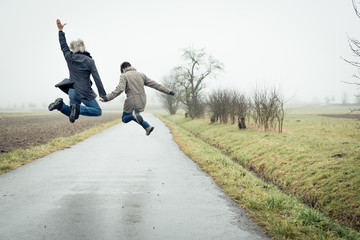 Senior Couple Jumping