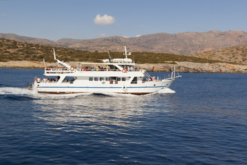Boat trip on the islands of the Adriatic Sea. Near the island of Crete. Greece.