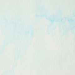 Blue and green abstract watercolor painting textured on white paper background