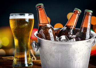 Beer bottles in ice bucket, © aedkafl