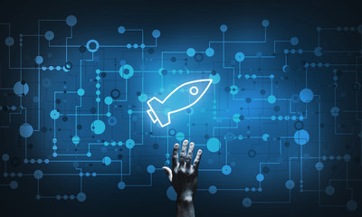 Technology idea concept with glowing rocket icon and touching it finger