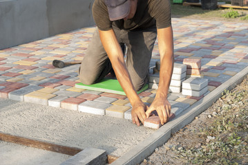 laying of paving slabs