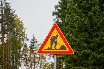 Red-Yellow Workers Caution Road Sign