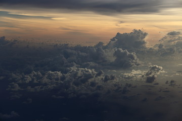 Sunset White Cloud sky at high level attitude, view from window airplane