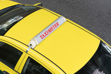 taxi meter sign on the taxi car