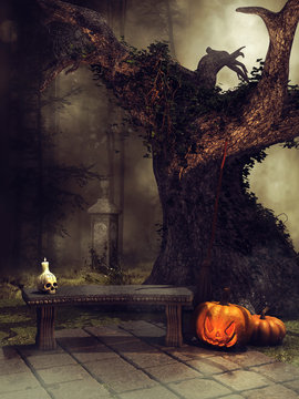 Stare drzewo, ławka, świeca w kształcie czaszki i dynia na Halloween